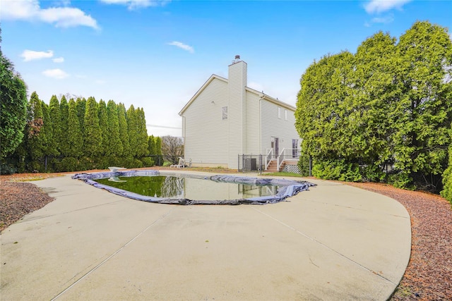 415 Spotswood Englishtown Rd, Nj, NJ 08831 - view of swimming pool featuring a covered pool and a patio