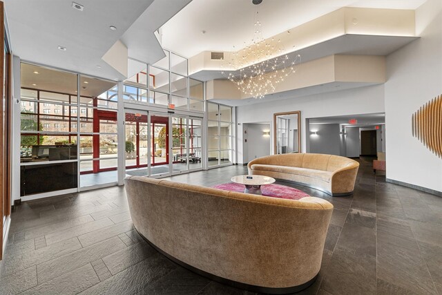 10 Stewart Pl Unit 4De, White Plains, NY 10603 - community lobby with a towering ceiling and floor to ceiling windows