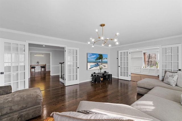 living area with french doors, crown molding, a chandelier, wood finished floors, and baseboards