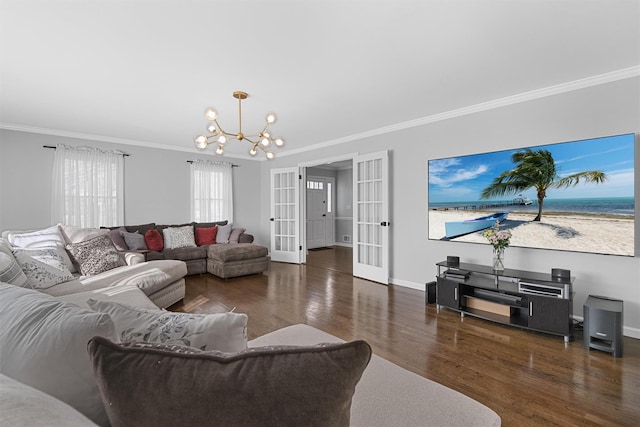 living area featuring ornamental molding, a chandelier, wood finished floors, french doors, and baseboards