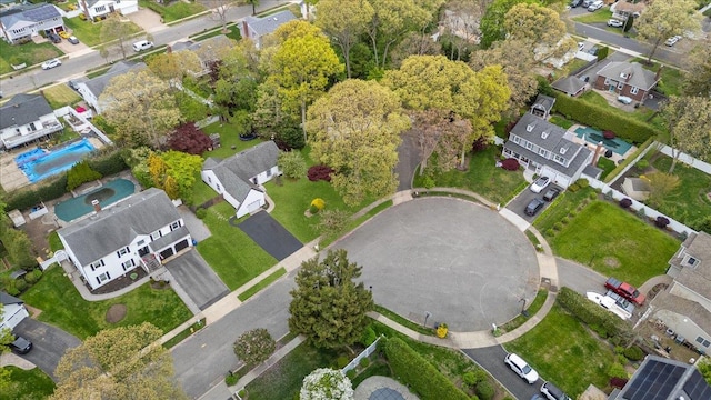 aerial view of property's location with nearby suburban area