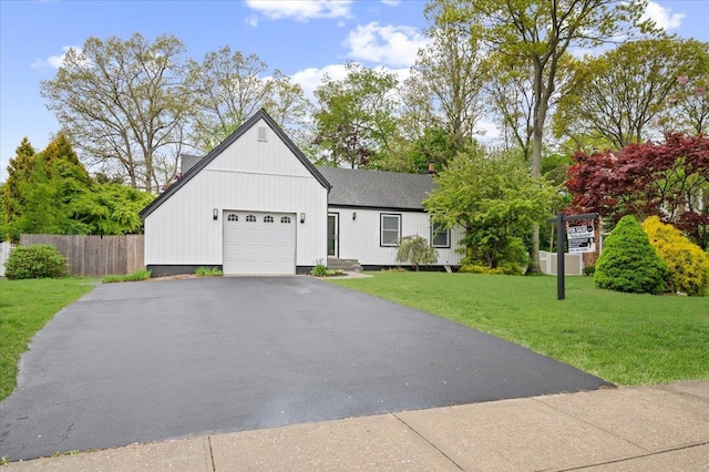 view of front of house featuring an attached garage and driveway