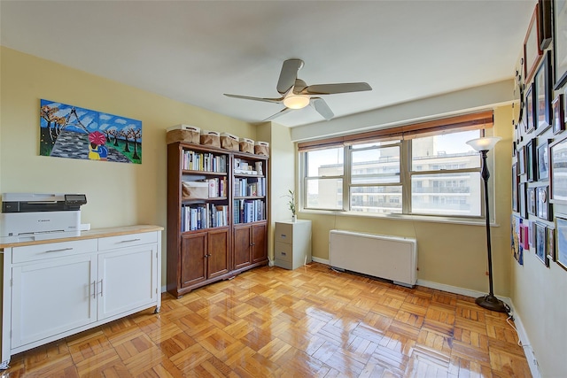102-10 66th Rd Unit 26H, Forest Hills, NY 11375 - office featuring radiator, baseboards, and ceiling fan