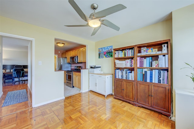 102-10 66th Rd Unit 26H, Forest Hills, NY 11375 - kitchen featuring stainless steel appliances, ceiling fan, and baseboards