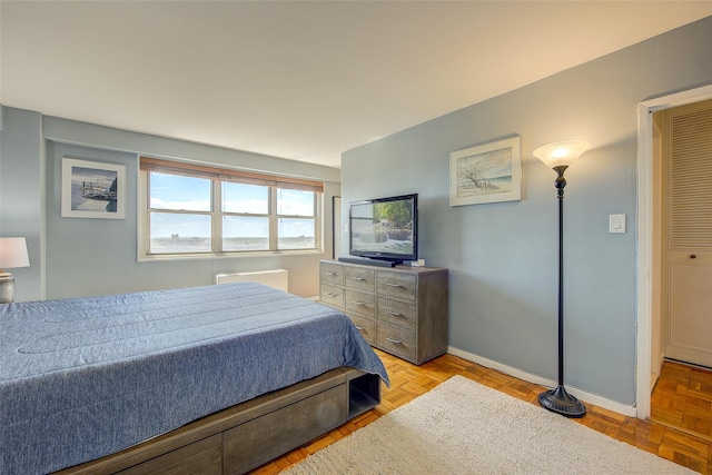 102-10 66th Rd Unit 26H, Forest Hills, NY 11375 - bedroom with baseboards