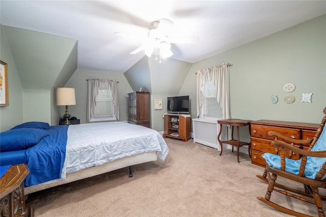 1875 Harte St, Baldwin, NY 11510 - bedroom featuring multiple windows, light carpet, vaulted ceiling, ceiling fan, and radiator heating unit