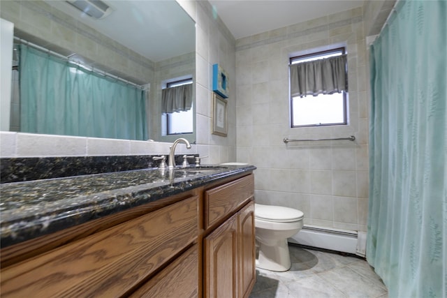 1875 Harte St, Baldwin, NY 11510 - full bathroom with tile walls, a baseboard radiator, toilet, vanity, and a shower with curtain