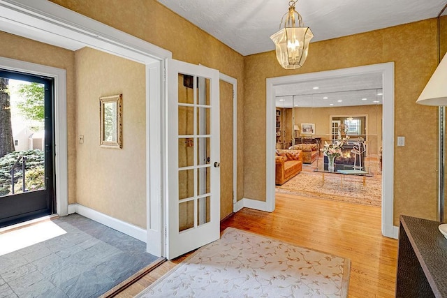 21 Hereford Rd, Great Neck, NY 11020 - entrance foyer featuring wood finished floors and baseboards