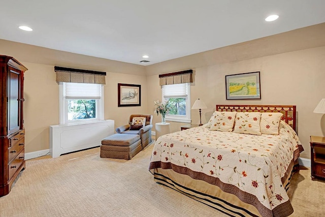 21 Hereford Rd, Great Neck, NY 11020 - bedroom featuring multiple windows, light carpet, recessed lighting, and baseboards