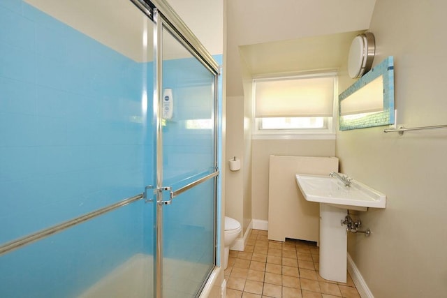 21 Hereford Rd, Great Neck, NY 11020 - bathroom featuring toilet, tile patterned flooring, a shower with door, and baseboards