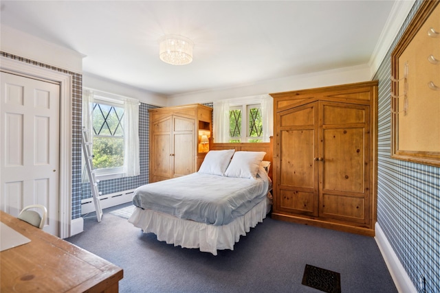 17 The Intervale, Roslyn Estates, NY 11576 - bedroom featuring a baseboard heating unit, multiple windows, wallpapered walls, dark carpet, and a chandelier