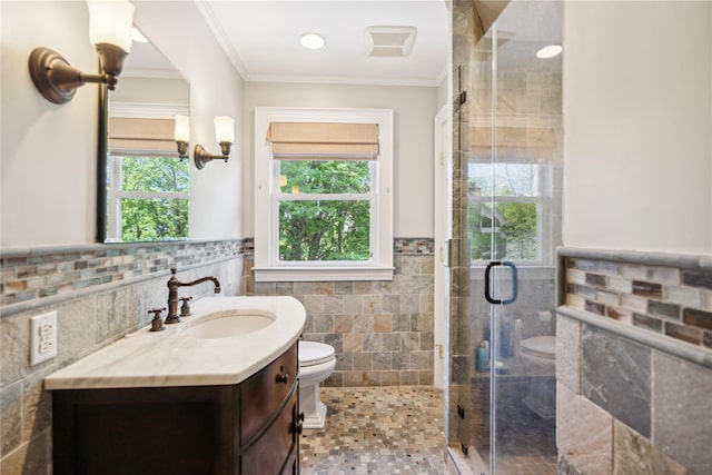 17 The Intervale, Roslyn Estates, NY 11576 - full bathroom featuring toilet, tile walls, vanity, a shower stall, and wainscoting