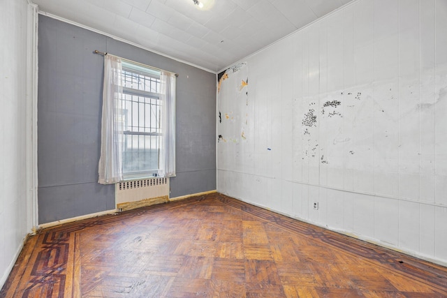 1410 Lincoln Pl, Brooklyn, NY 11213 - unfurnished room with radiator, ornamental molding, and baseboards