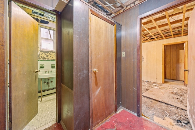1410 Lincoln Pl, Brooklyn, NY 11213 - hallway with a baseboard heating unit