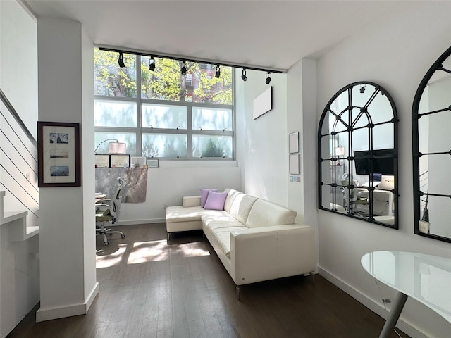 425 E 13th St Unit 1J, New York Manhattan, NY 10009 - sitting room with baseboards, dark wood-style flooring, stairway, and an office area