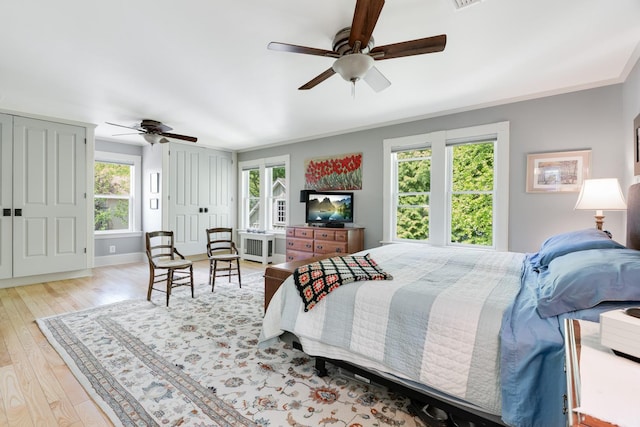 4 Oak St, Cold Spring, NY 10516 - bedroom featuring multiple windows, hardwood / wood-style flooring, a ceiling fan, ornamental molding, and baseboards