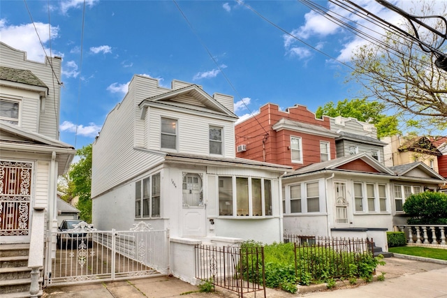 1804 New York Ave, Brooklyn, NY 11210 - view of front of property featuring a gate and a fenced front yard