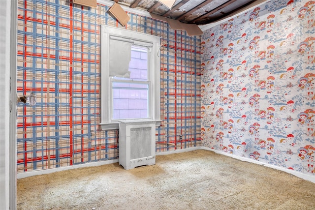 1804 New York Ave, Brooklyn, NY 11210 - carpeted empty room featuring baseboards and wallpapered walls