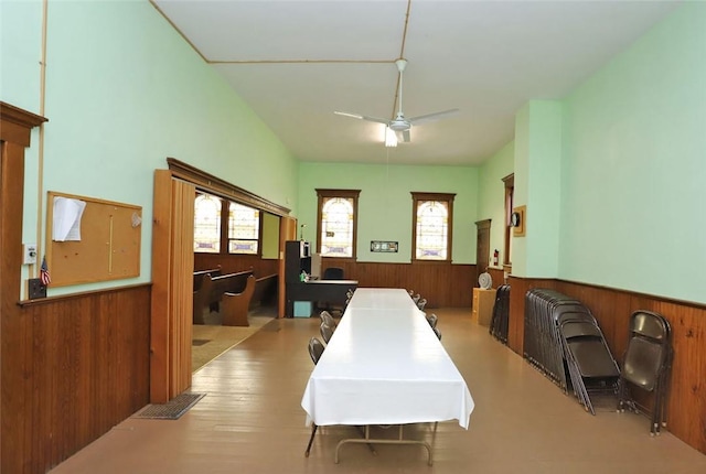 14 Hankins Rd, Hankins, NY 12741 - dining space featuring wainscoting, healthy amount of natural light, ceiling fan, wood walls, and wood finished floors