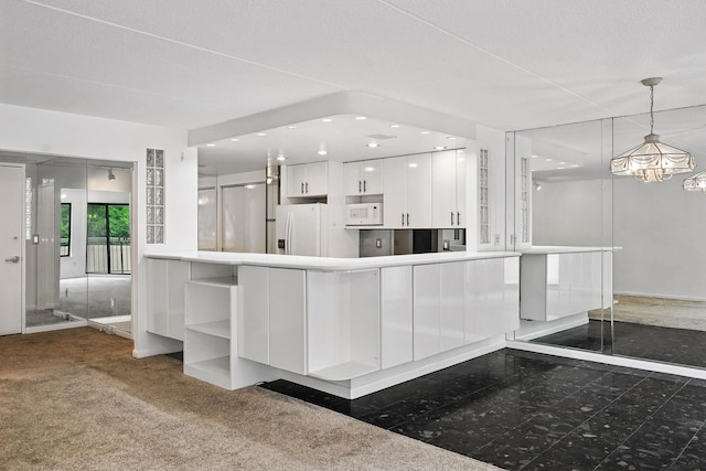 300 High Point Dr Unit 313, Hartsdale, NY 10530 - kitchen with white appliances, white cabinets, open shelves, hanging light fixtures, and carpet floors