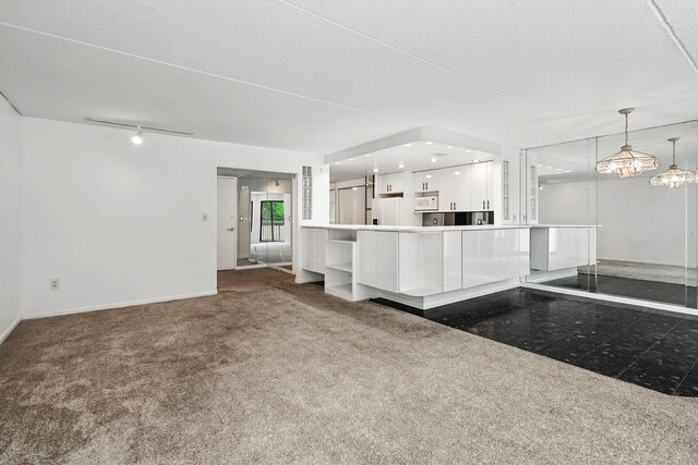 300 High Point Dr Unit 313, Hartsdale, NY 10530 - kitchen featuring white cabinets, open shelves, white appliances, carpet floors, and pendant lighting