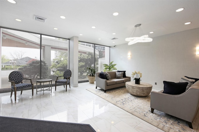300 High Point Dr Unit 313, Hartsdale, NY 10530 - building lobby with recessed lighting and a wall of windows