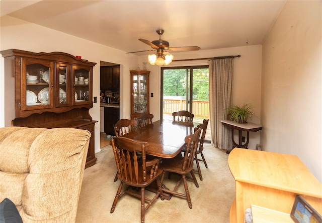 3042 Gomer St, Yorktown Heights, NY 10598 - dining space with light colored carpet and a ceiling fan