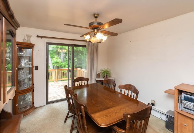 3042 Gomer St, Yorktown Heights, NY 10598 - dining space with a ceiling fan, light colored carpet, and a baseboard radiator