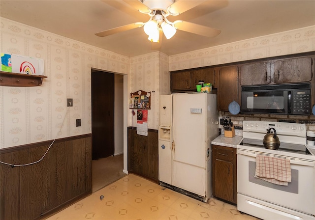 3042 Gomer St, Yorktown Heights, NY 10598 - kitchen featuring white appliances, light floors, dark brown cabinetry, ceiling fan, and light countertops