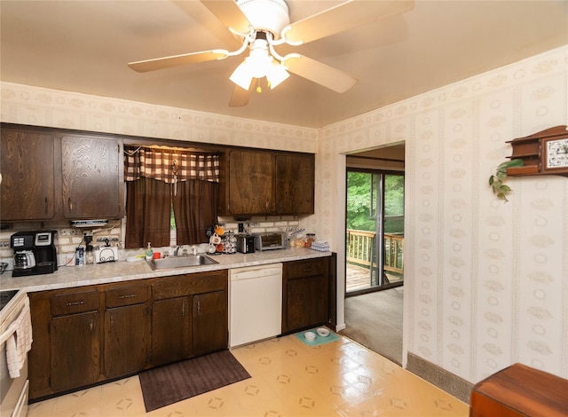 3042 Gomer St, Yorktown Heights, NY 10598 - kitchen with white dishwasher, light floors, a sink, dark brown cabinets, and light countertops