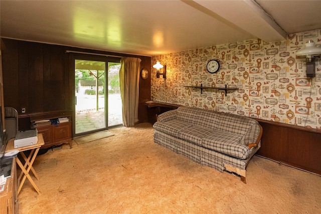 3042 Gomer St, Yorktown Heights, NY 10598 - sitting room with light colored carpet, wallpapered walls, wood walls, and a wainscoted wall