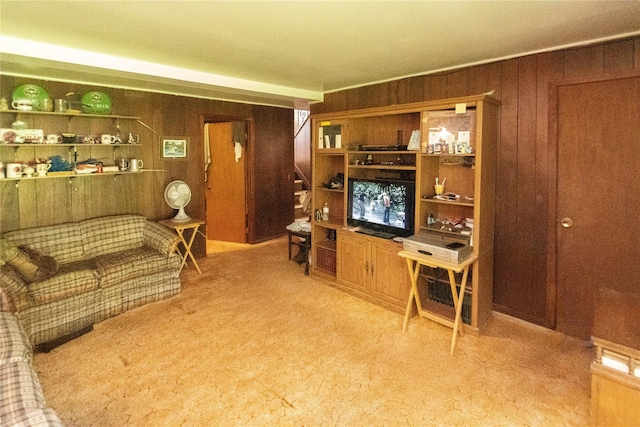 3042 Gomer St, Yorktown Heights, NY 10598 - living area featuring wooden walls and light colored carpet