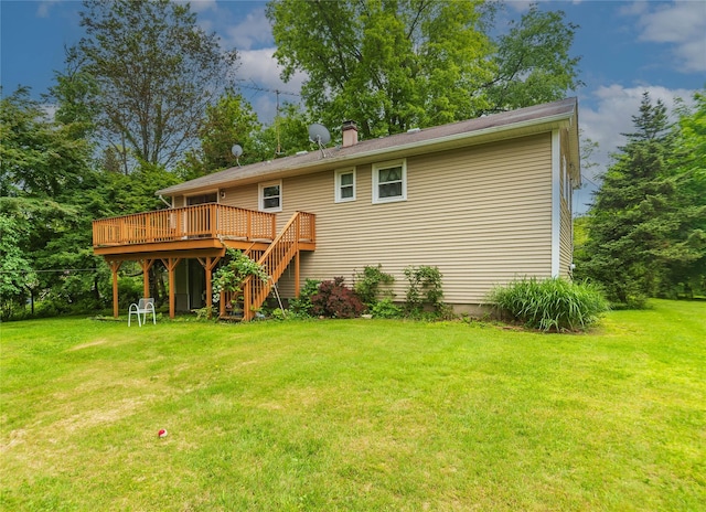 3042 Gomer St, Yorktown Heights, NY 10598 - rear view of house featuring a deck, a lawn, a chimney, and stairs
