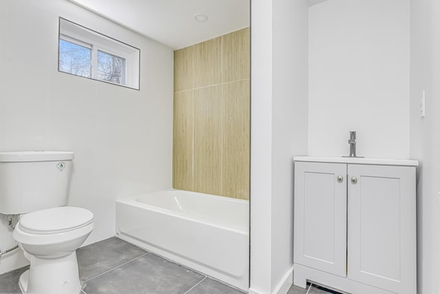 bathroom with toilet, tile walls, a bath, and a sink