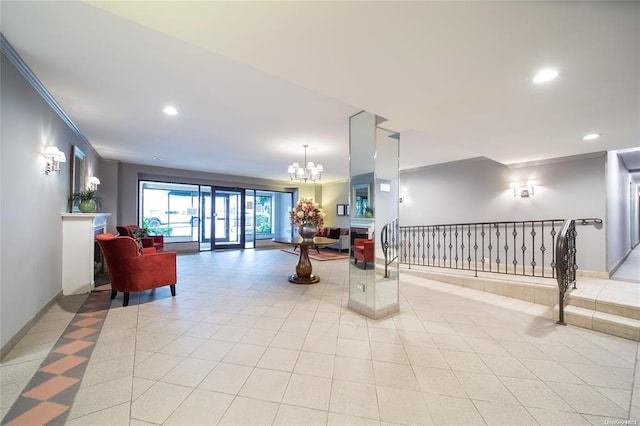building lobby with crown molding and recessed lighting