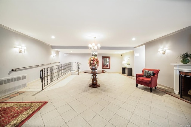hallway featuring radiator heating unit, crown molding, light tile patterned floors, recessed lighting, and a chandelier