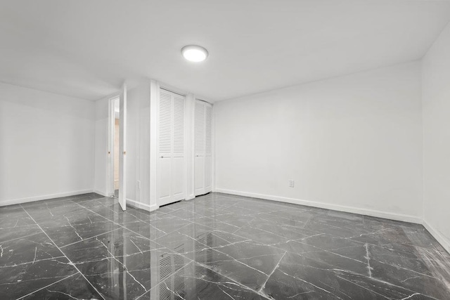 166-03 69th Ave, Fresh Meadows, NY 11366 - finished basement featuring dark marble finish floors and baseboards