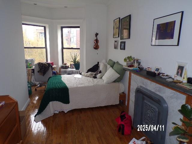 173 Quincy St, Brooklyn, NY 11216 - bedroom featuring hardwood / wood-style flooring