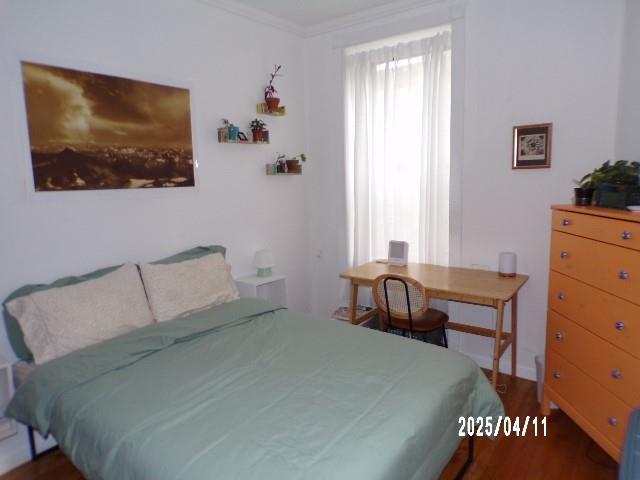 173 Quincy St, Brooklyn, NY 11216 - bedroom with wood finished floors and ornamental molding
