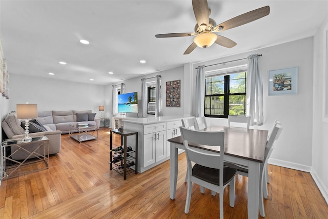 1271 California Rd Unit 1L, Eastchester, NY 10709 - dining space with light wood finished floors, recessed lighting, ceiling fan, and baseboards