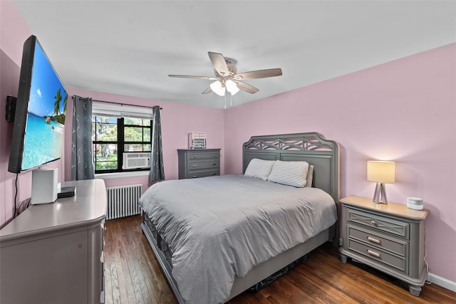 1271 California Rd Unit 1L, Eastchester, NY 10709 - bedroom with radiator, dark wood-type flooring, cooling unit, a ceiling fan, and baseboards