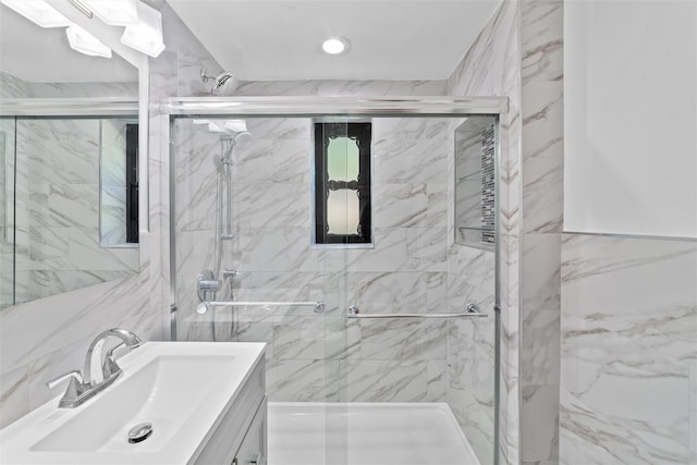 1271 California Rd Unit 1L, Eastchester, NY 10709 - bathroom with vanity, a marble finish shower, and recessed lighting