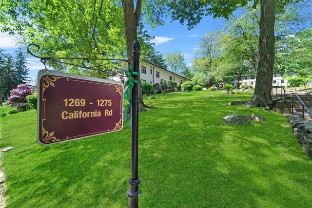 1271 California Rd Unit 1L, Eastchester, NY 10709 - community sign with a lawn