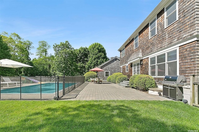 394 Mill Rd, Westhampton, NY 11977 - view of swimming pool with area for grilling and a patio