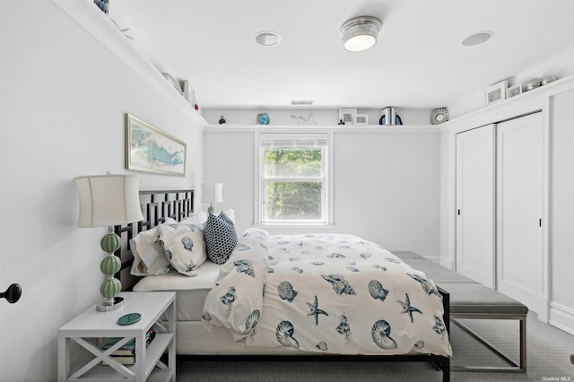 394 Mill Rd, Westhampton, NY 11977 - bedroom with carpet floors and a closet