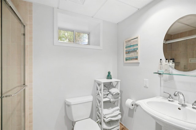 394 Mill Rd, Westhampton, NY 11977 - full bath featuring a sink, a tile shower, and toilet