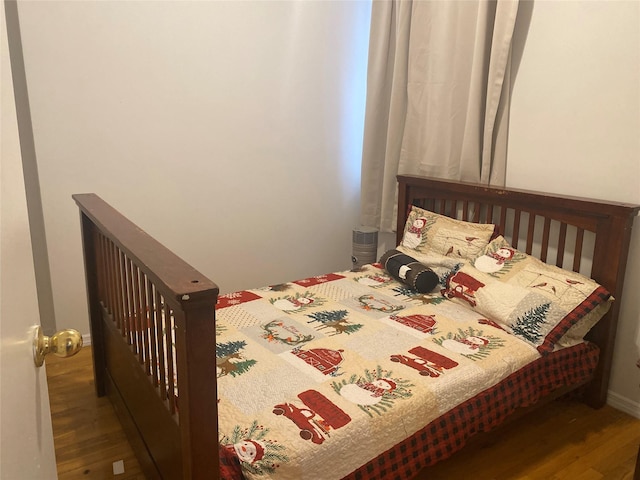 8410 101st St Unit 3U, Richmond Hill, NY 11418 - bedroom featuring wood finished floors and baseboards