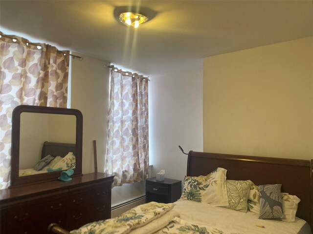 8410 101st St Unit 3U, Richmond Hill, NY 11418 - bedroom with a baseboard radiator