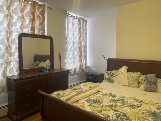 8410 101st St Unit 3U, Richmond Hill, NY 11418 - bedroom featuring baseboard heating