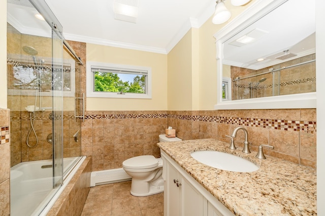 bathroom featuring crown molding, tile walls, a baseboard heating unit, tile patterned flooring, and toilet
